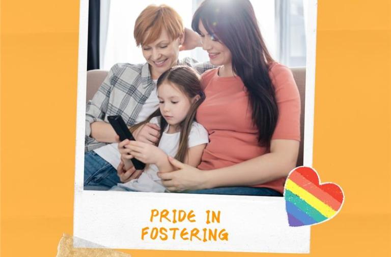 LGBTQ+ family sitting together on the sofa