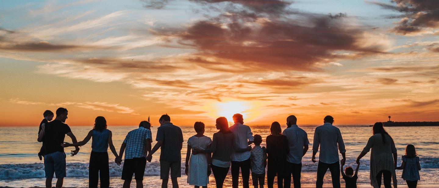 family day out by the beach at sunset